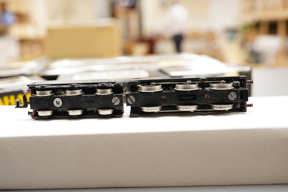 Thirteen N gauge railway by Graham Farish, etc., including two locomotives; a BR Class 4 0-6-0 tender locomotive, 4232, and an LMS 0-6-0T locomotive, 16389, together with two bogie coaches, eight freight wagons, and a Pe